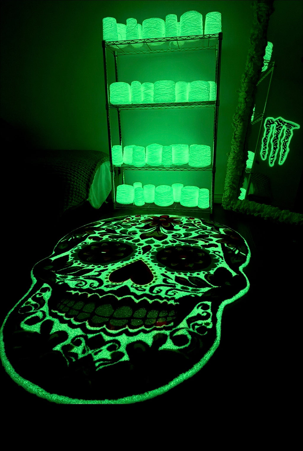 Glowing skull rug and shelves in a dark room